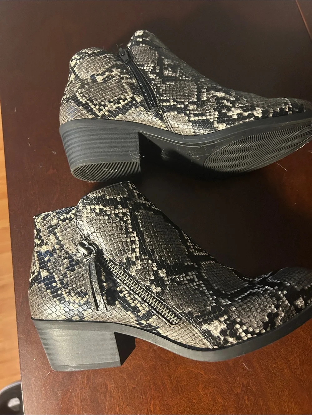 Arizona Jean Company Snake-Print Ankle Booties in Black and Cream